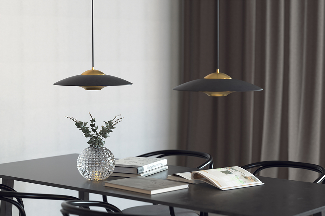 Array of concrete pendant lights suspended above a dining area, establishing rhythm and spatial order.